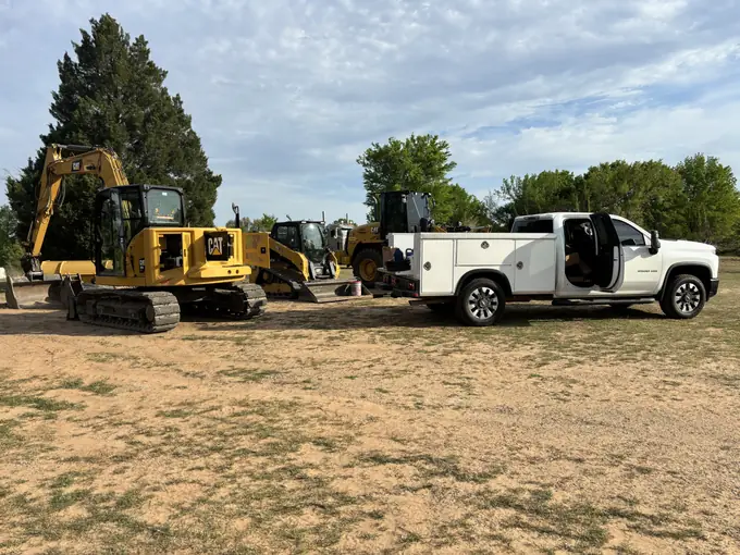 Lineup of serviced fleet equipment ready for return to jobsite